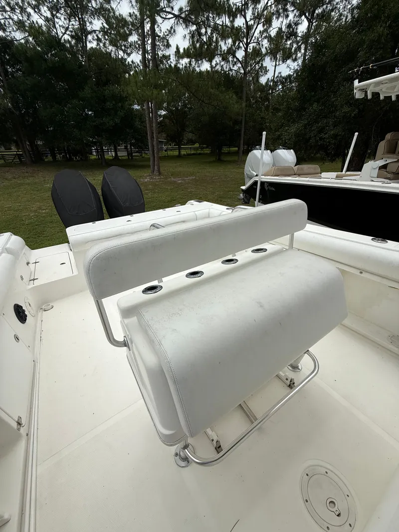 Slide: The Image of 1998 Century 3000 boat with white seating area. - 6