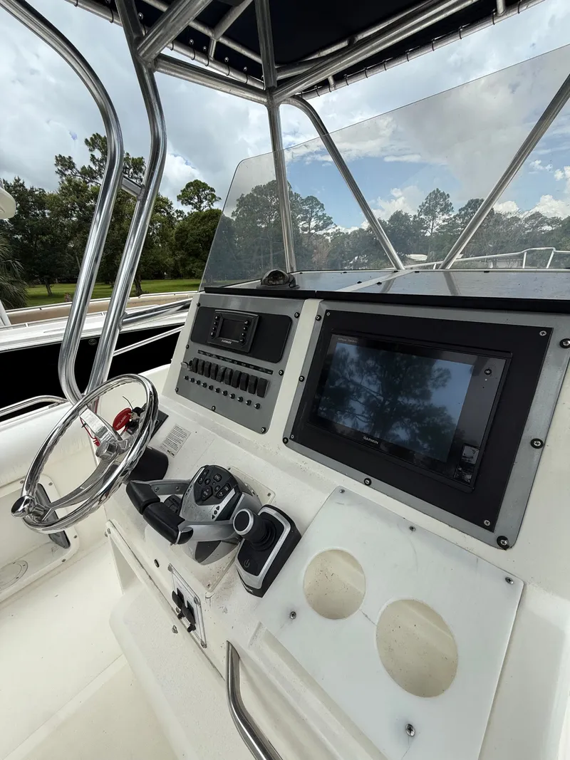 Slide: The Image of Control console of a 1998 Century 3000 boat. - 9