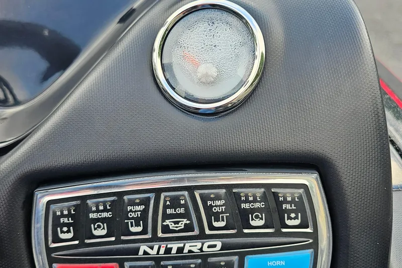 Slide: The Image of Control panel of a 2017 Nitro Z20 Pro boat with various function buttons. - 15