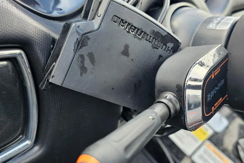 Slide: The Image of Close-up of a 2017 Nitro Z20 Pro dashboard with electronic controls and branding. - 18