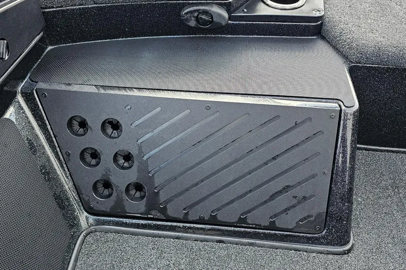 Slide: The Image of Interior of a 2017 Nitro Z20 Pro boat showing a black panel with ventilation holes. - 25