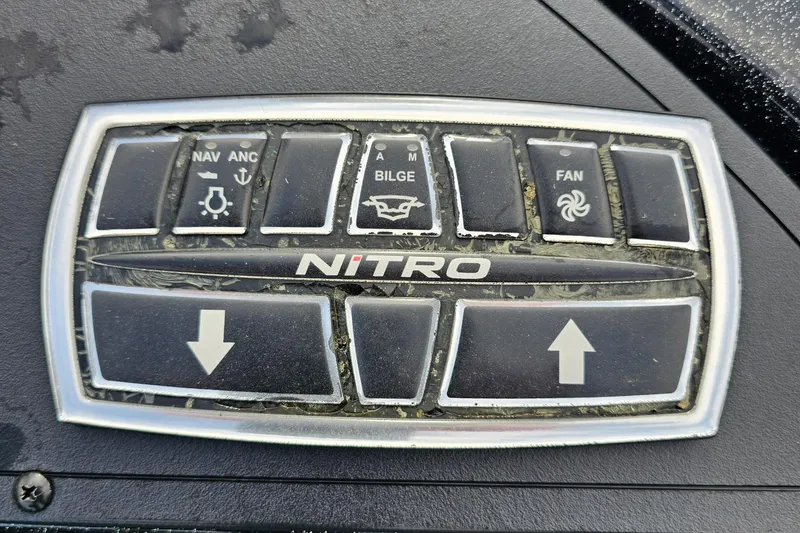 Slide: The Image of Control panel of a 2017 Nitro Z20 Pro boat with navigation and fan buttons. - 30
