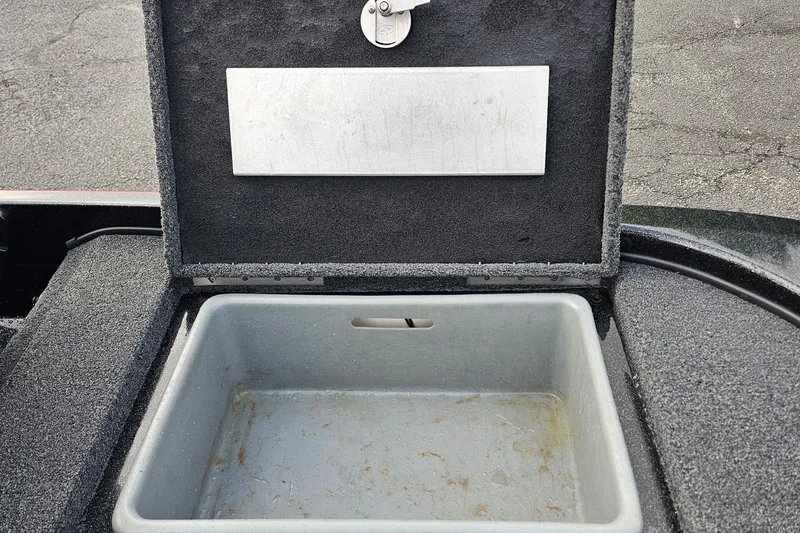 Slide: The Image of Open storage compartment in a 2017 Nitro Z20 Pro boat. - 35