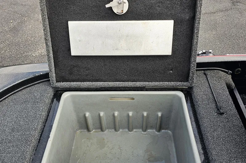 Slide: The Image of Open storage compartment in a 2017 Nitro Z20 Pro boat. - 36
