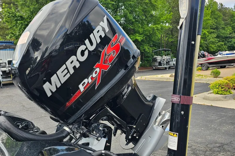 Slide: The Image of Mercury Pro XS outboard motor on a 2017 Nitro Z20 Pro boat in a parking lot. - 37