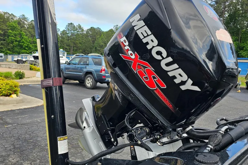 Slide: The Image of Mercury Pro XS engine on 2017 Nitro Z20 Pro boat in parking lot. - 38