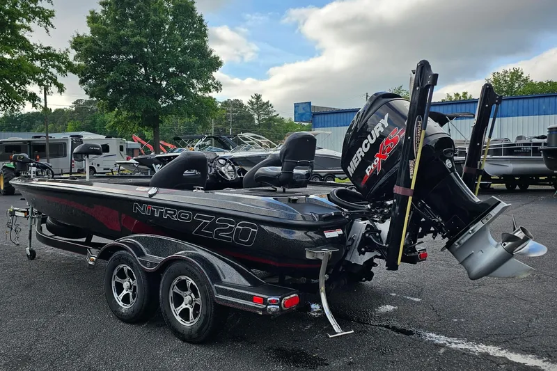 Slide: The Image of 2017 Nitro Z20 Pro boat with Mercury Pro XS engine in outdoor setting. - 5