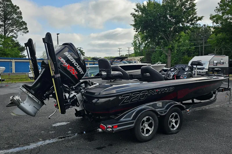 Slide: The Image of 2017 Nitro Z20 Pro boat with Mercury engine, parked outdoors on a trailer. - 6