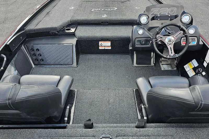 Slide: The Image of Interior of a 2017 Nitro Z20 Pro boat featuring dual seats and steering console. - 8