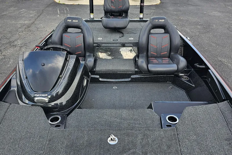 Slide: The Image of 2017 Nitro Z20 Pro boat interior with dual seats and sleek dashboard design. - 9