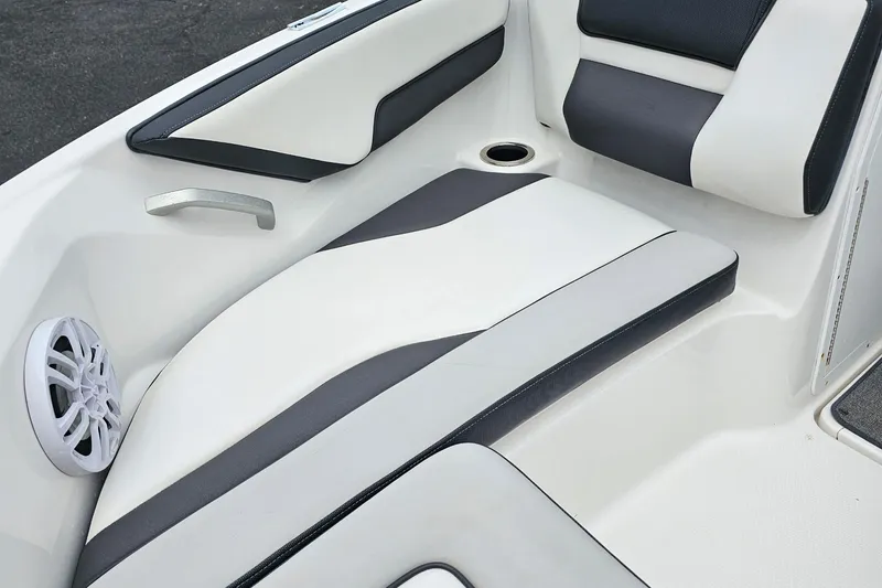 Slide: The Image of 2019 Yamaha Boats AR195 interior seating with speaker and cup holder. - 29