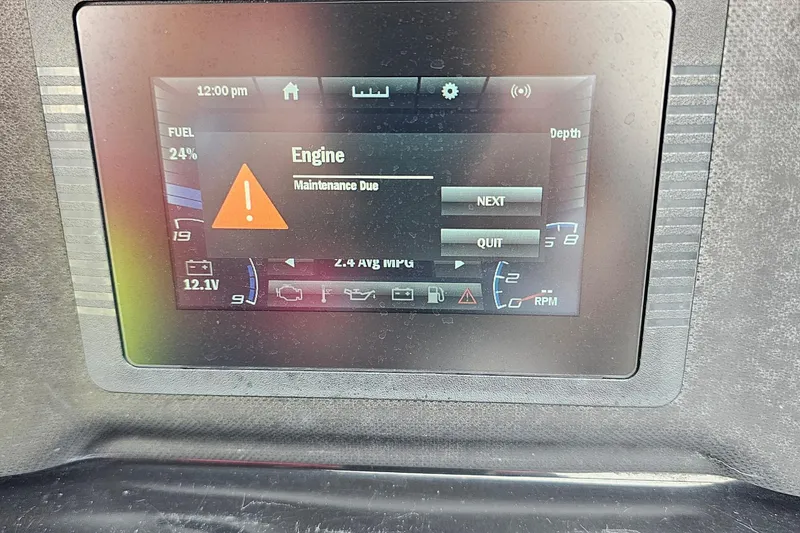 Slide: The Image of Dashboard of 2019 Yamaha Boats AR195 showing engine maintenance alert. - 9