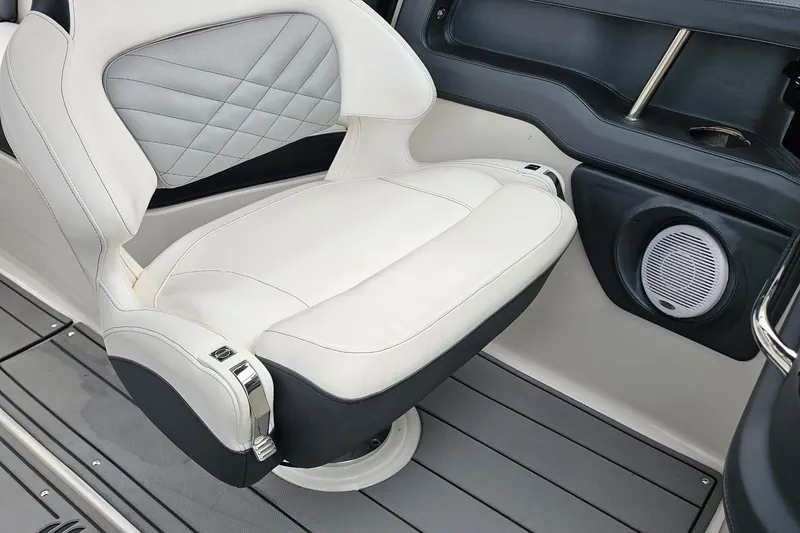 Slide: The Image of Luxury seating in 2021 Chaparral 307 SSX boat, featuring premium upholstery and sleek design. - 19