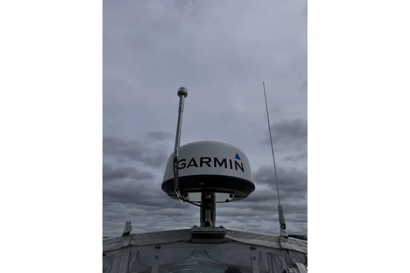 Slide: The Image of Garmin radar on 2020 Hunt Yachts Harrier 26 against cloudy sky. - 21