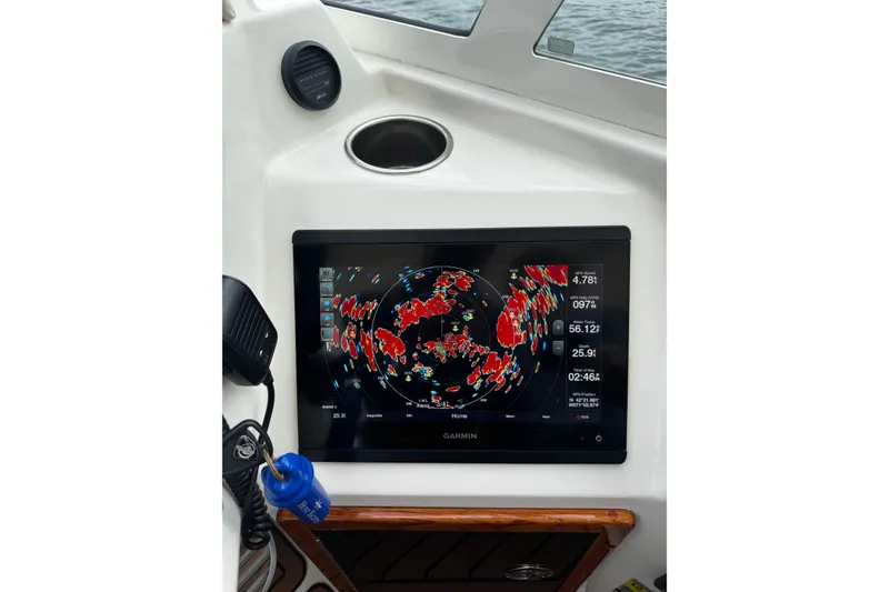 Slide: The Image of Garmin navigation display on 2020 Hunt Yachts Harrier 26 boat dashboard. - 6