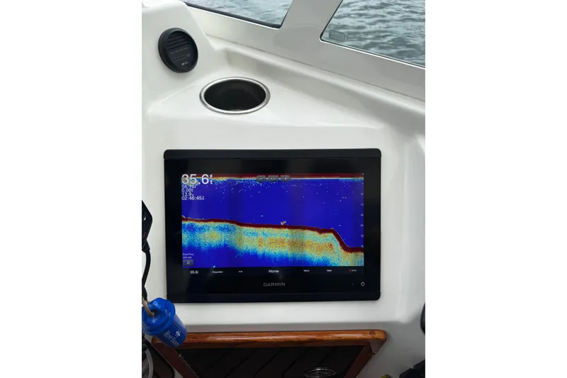 Slide: The Image of Garmin fishfinder display on 2020 Hunt Yachts Harrier 26, showing underwater topography. - 7