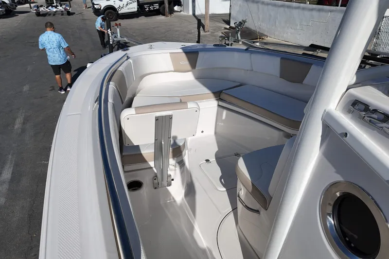 Slide: The Image of 2025 Robalo R232 Explorer boat interior with seating and storage compartments. - 3