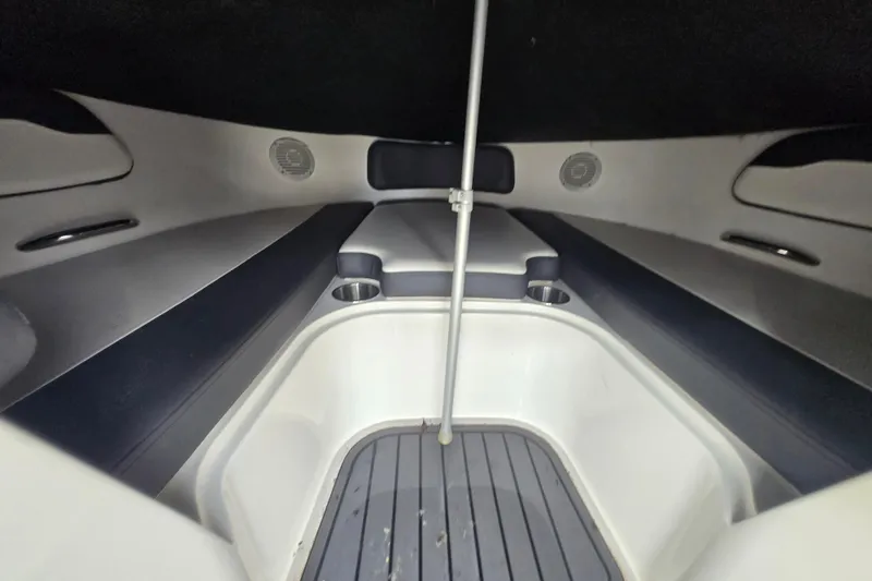 Slide: The Image of Interior of 2020 Bayliner VR6 Bowrider OB, featuring seating and cup holders. - 1