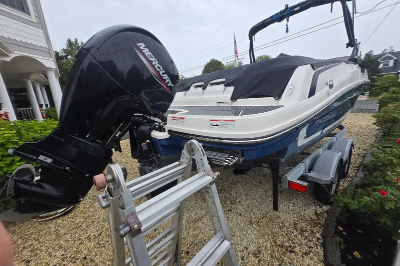 Slide: The Image of 2020 Bayliner VR6 Bowrider OB with Mercury outboard engine on trailer. - 11