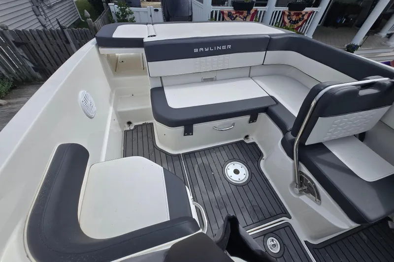 Slide: The Image of 2020 Bayliner VR6 Bowrider OB interior with sleek seating and modern design. - 2