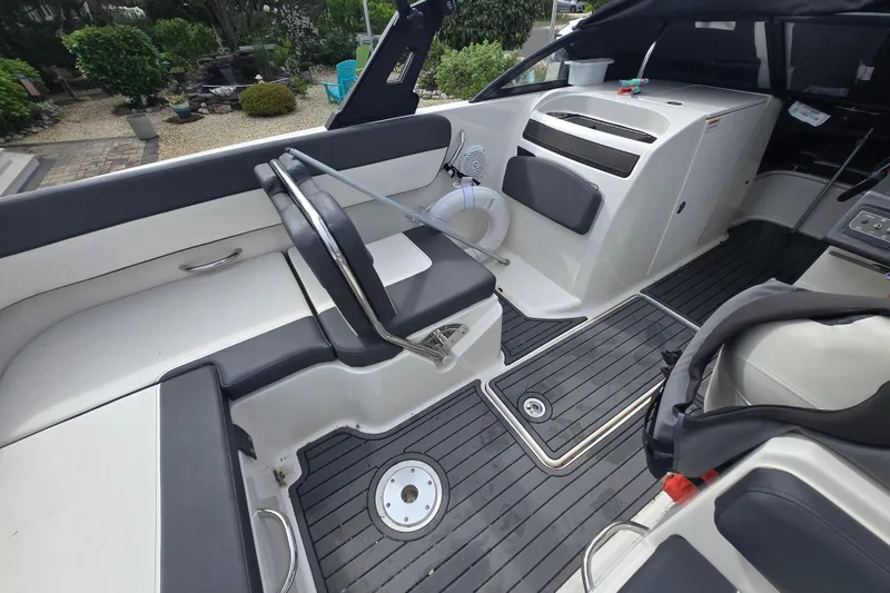 Slide: The Image of 2020 Bayliner VR6 Bowrider OB interior with sleek seating and modern design. - 5