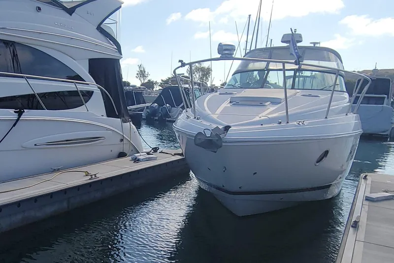 Slide: The Image of 2017 Rinker EX 370 boat cockpit with modern controls and comfortable seating. - 8