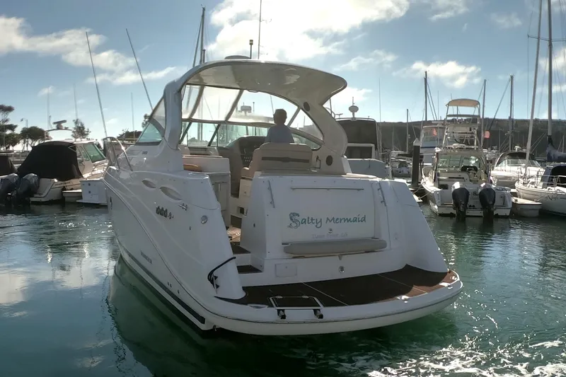 Slide: The Image of 2017 Rinker EX 370 helm with advanced navigation and control systems. - 9