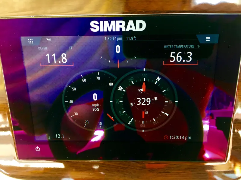 Slide: The Image of Simrad display on 2022 Chaparral 230 SSi showing depth and water temperature. - 27