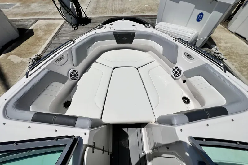 Slide: The Image of 2022 Chaparral 230 SSi boat interior with spacious seating and modern design. - 39