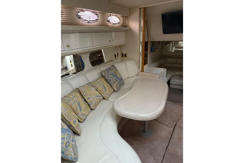 Slide: The Image of Luxurious interior of 1997 Sea Ray Sundancer 370 yacht with plush seating and elegant decor. - 3
