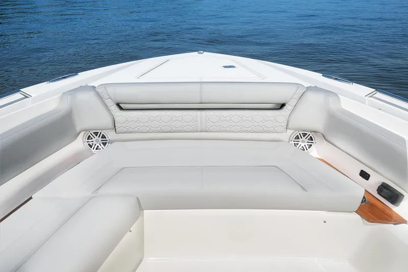 Slide: The Image of Manufacturer Provided Image: 2025 Tiara Yachts 38 LS boat interior with luxurious seating and ocean view. - 15