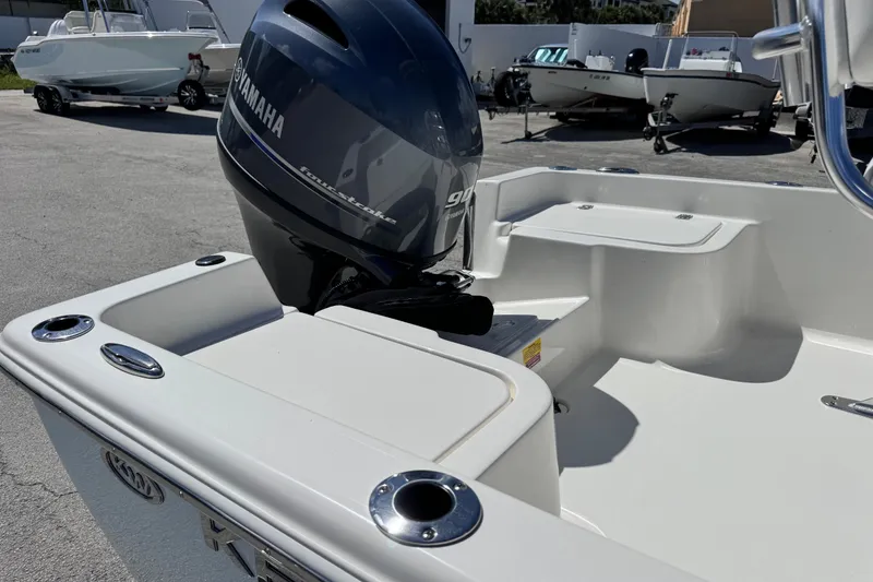 Slide: The Image of 2026 Key West 1720 Center Console boat with Yamaha outboard motor in a marina. - 20