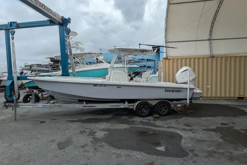 Slide: The Image of 2020 Everglades 243 Center Console boat on trailer at marina. - 3