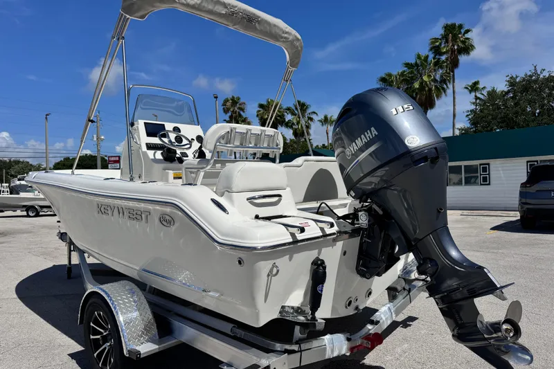 Slide: The Image of 2026 Key West 189 FS boat with Yamaha 115 engine on trailer. - 14