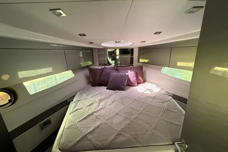 Slide: The Image of Luxurious cabin interior of 2023 Schaefer 400 Sport yacht with cozy bedding. - 8