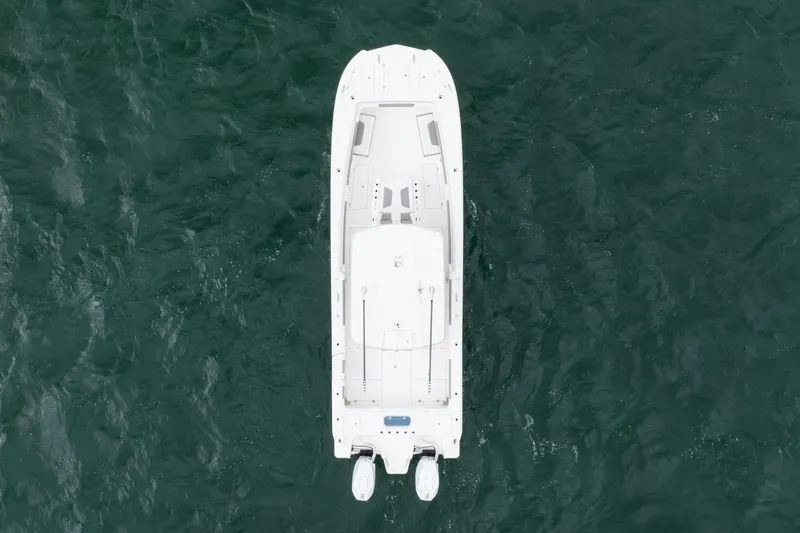 Slide: The Image of Aerial view of 2024 Caymas 341 CC boat on open water. - 17