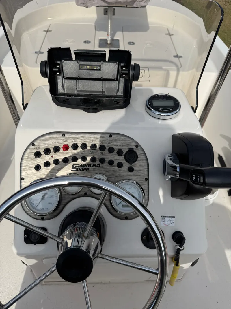 Slide: The Image of Control console of a 2020 Carolina Skiff 17 JLS boat. - 10