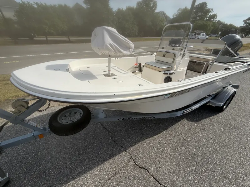 Slide: The Image of 2020 Carolina Skiff 17 JLS boat on trailer, side view. - 2