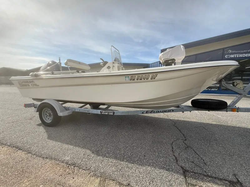 Slide: The Image of 2020 Carolina Skiff 17 JLS boat on trailer outdoors. - 4