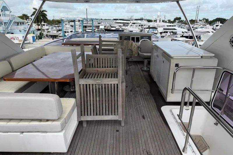 Slide: The Image of Flybridge of 2017 Azimut Fly 72 yacht with seating and dining area. - 10