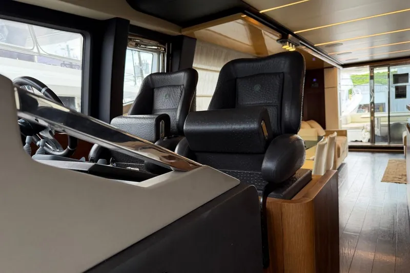 Slide: The Image of Luxurious interior of 2017 Azimut Fly 72 yacht with modern seating and sleek design. - 13