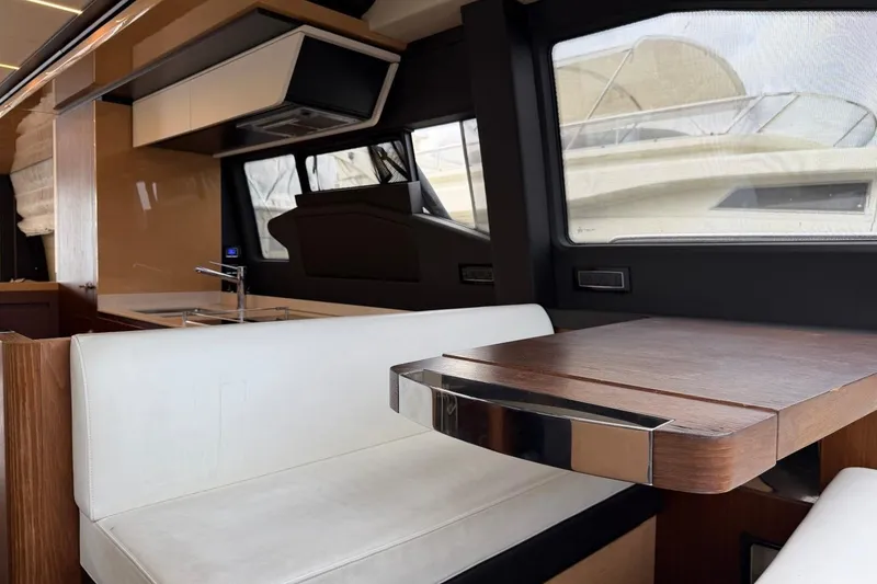 Slide: The Image of Luxurious interior of 2017 Azimut Fly 72 yacht with sleek dining area and modern design. - 14