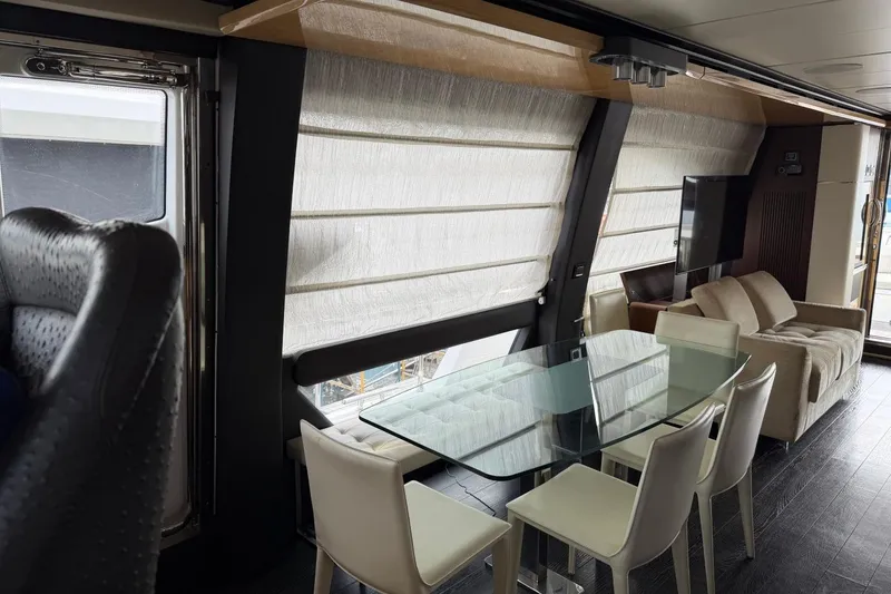 Slide: The Image of Luxurious interior of 2017 Azimut Fly 72 yacht with modern dining area and seating. - 17