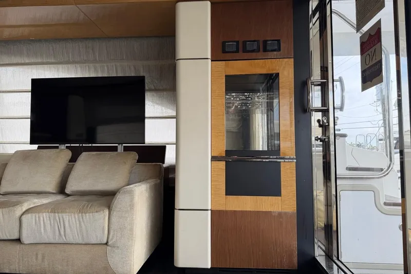 Slide: The Image of Luxurious interior of 2017 Azimut Fly 72 yacht with modern sofa and TV setup. - 21