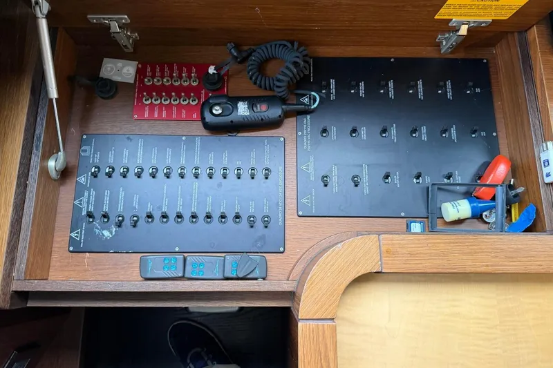 Slide: The Image of Control panel of a 2017 Azimut Fly 72 yacht with switches and tools. - 31