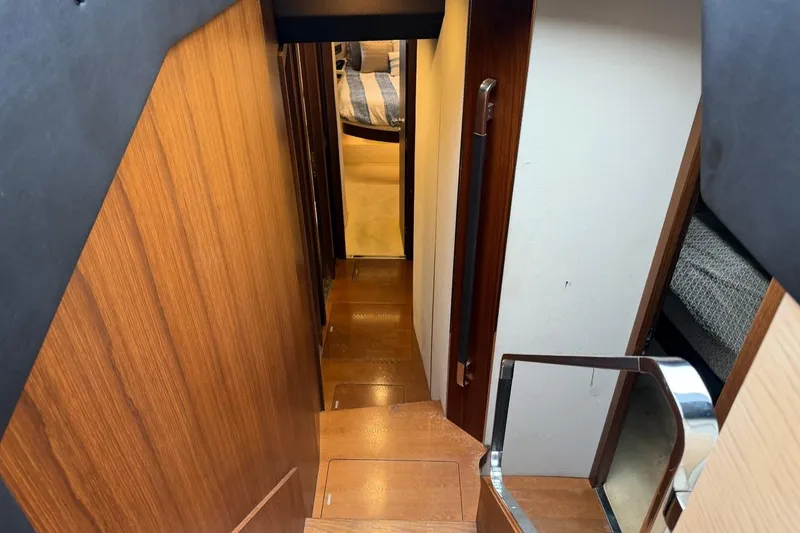 Slide: The Image of Interior staircase of 2017 Azimut Fly 72 yacht with wooden finish. - 36