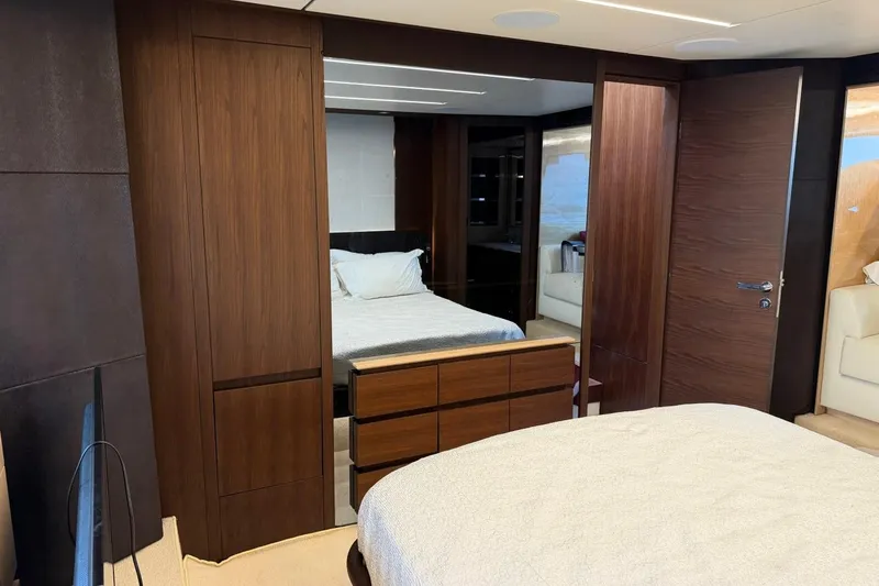 Slide: The Image of Luxurious bedroom interior of 2017 Azimut Fly 72 yacht with elegant wood finishes. - 40