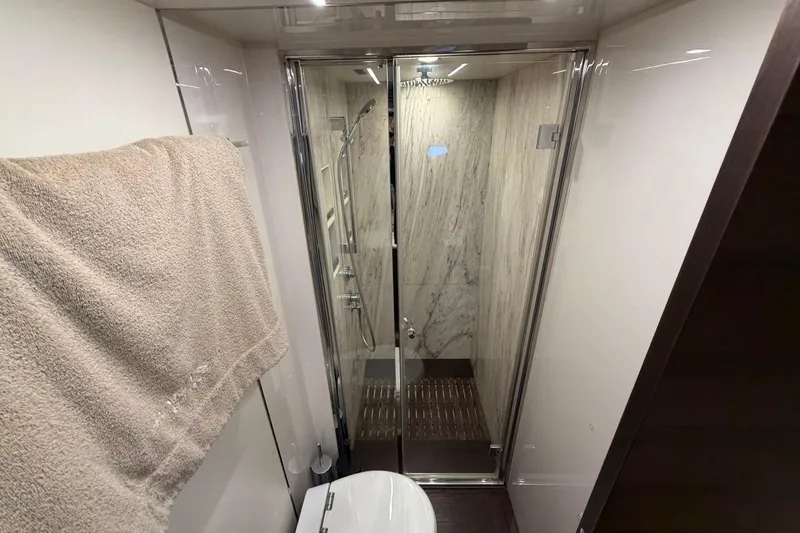 Slide: The Image of Luxurious bathroom in 2017 Azimut Fly 72 yacht with modern shower and towel. - 42