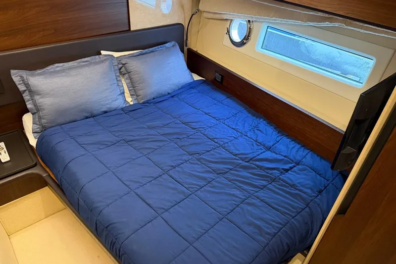 Slide: The Image of Luxurious bedroom interior of 2017 Azimut Fly 72 yacht with blue bedding. - 45