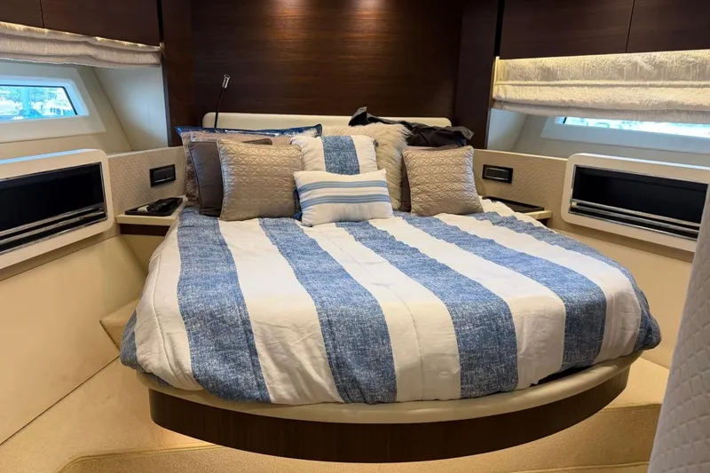 Slide: The Image of Luxurious bedroom interior of 2017 Azimut Fly 72 yacht with striped bedding. - 47